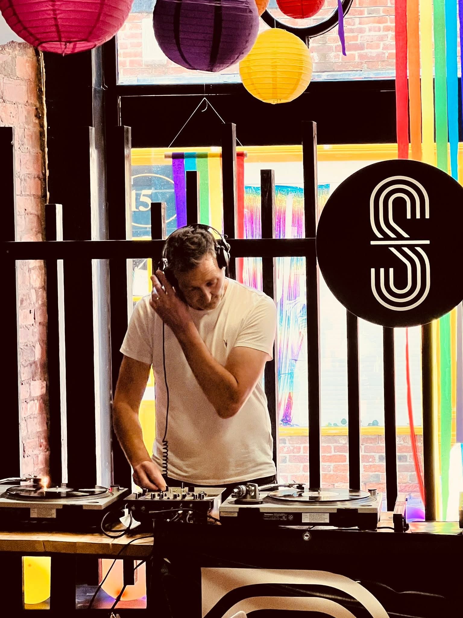 Nick Hopewell DJing at an indoor venue