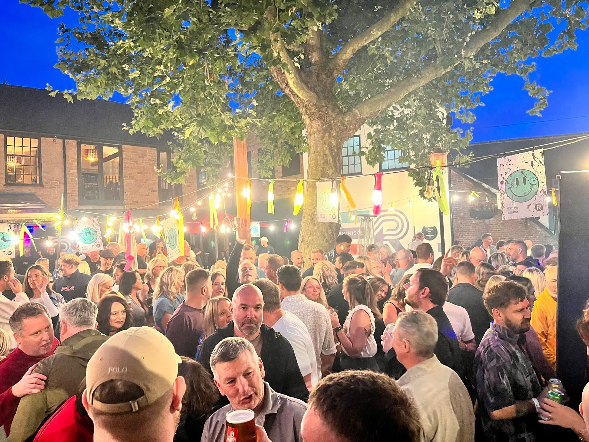 Crowd enjoying a REM event