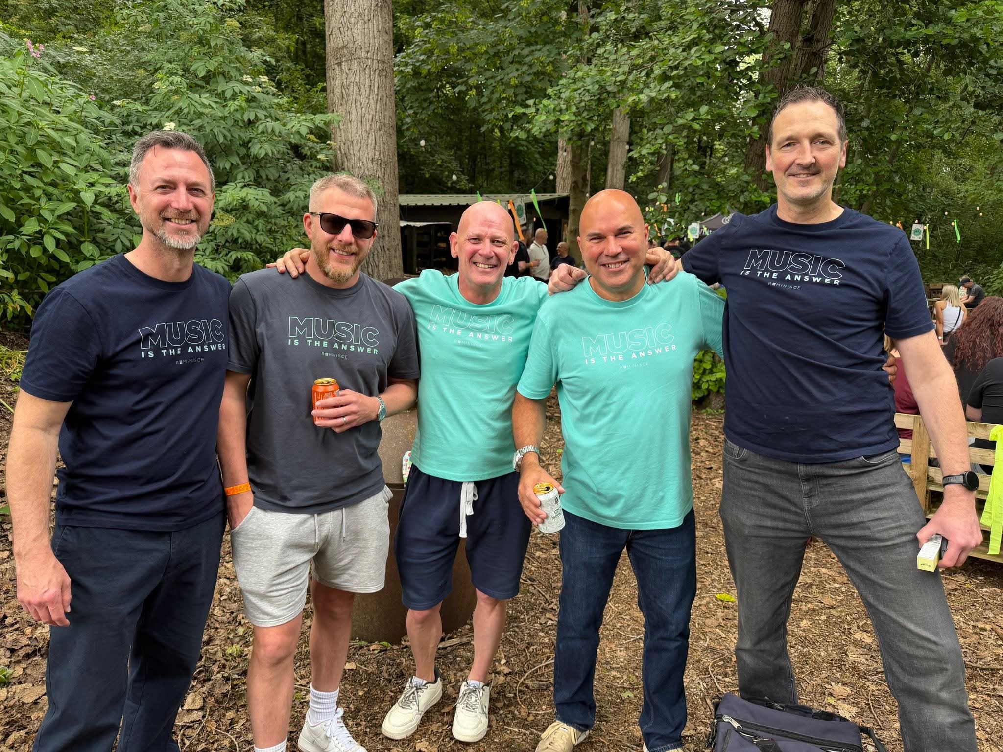 DJs and friends together outdoors