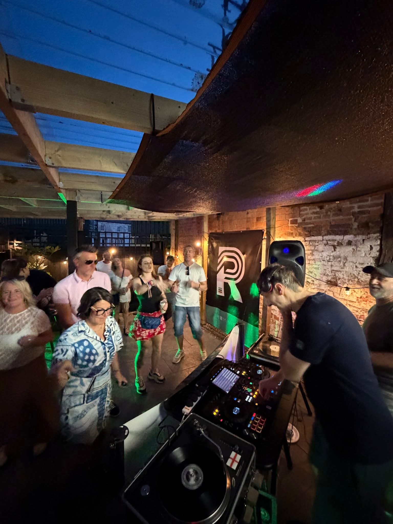 Crowd gathered around the DJ booth